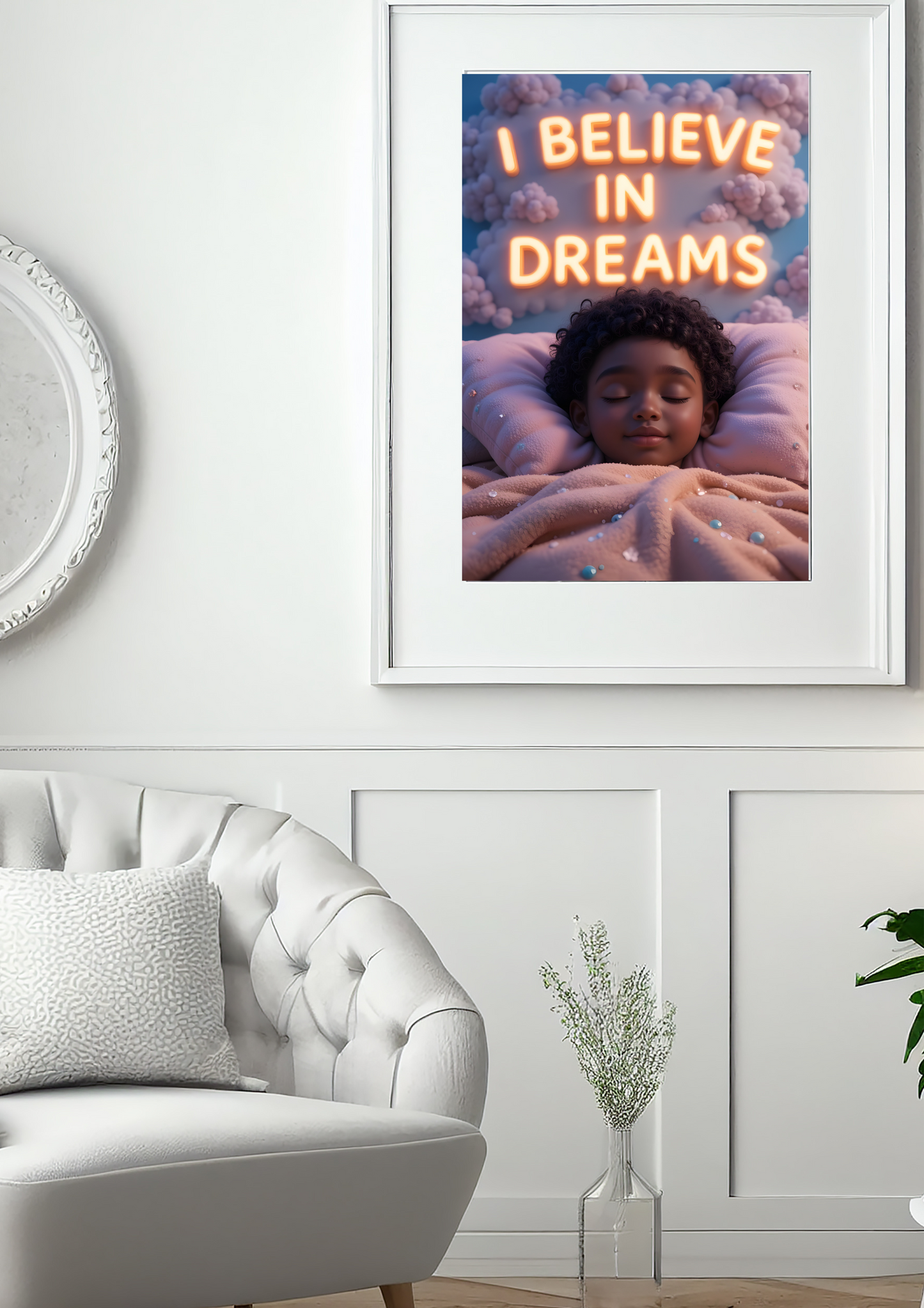 Framed artwork of a child in bed with 'I Believe in Dreams' text above a white sofa.