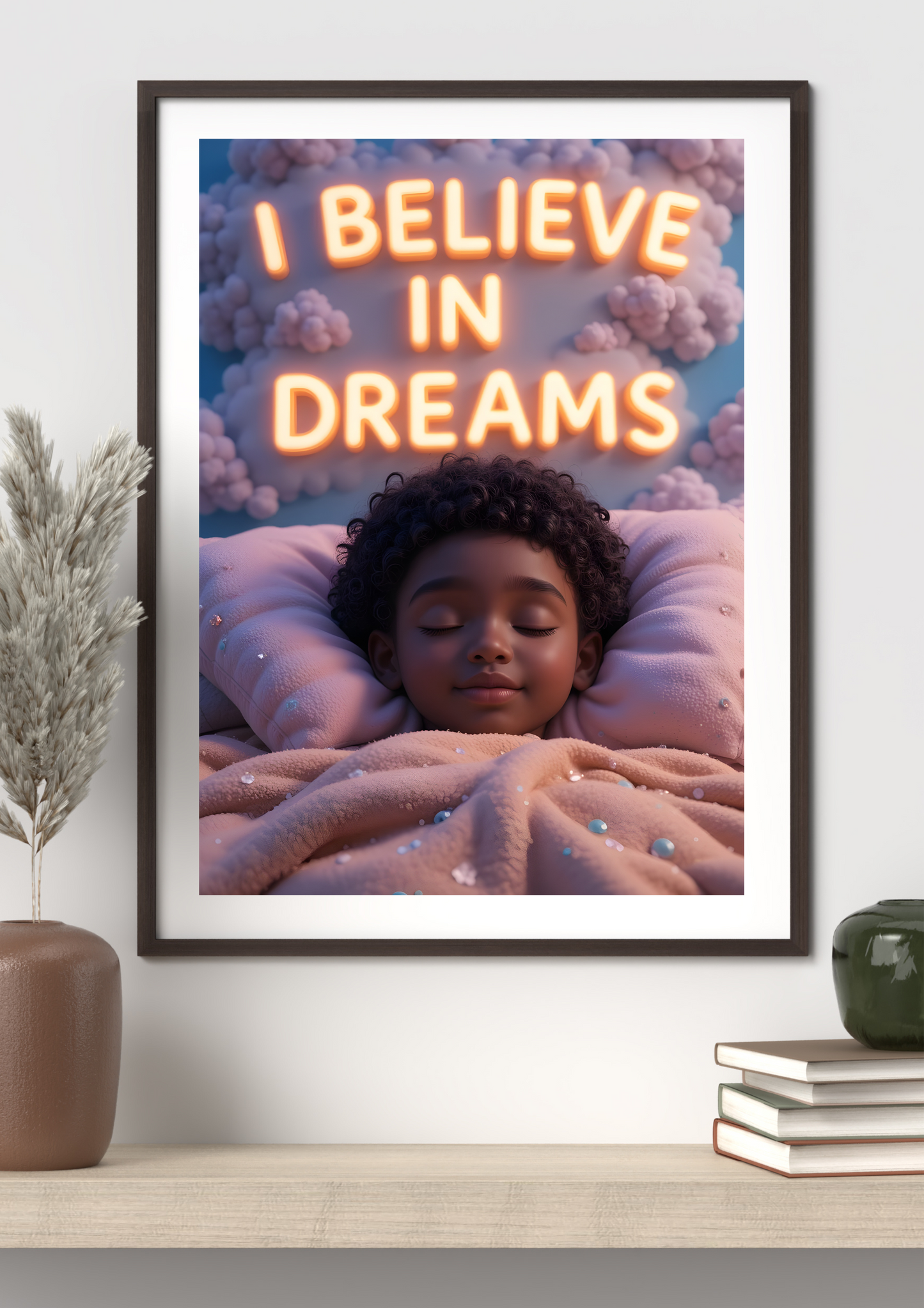 Framed artwork of a child lying down with 'I Believe in Dreams' text above them, on a shelf with decor items.