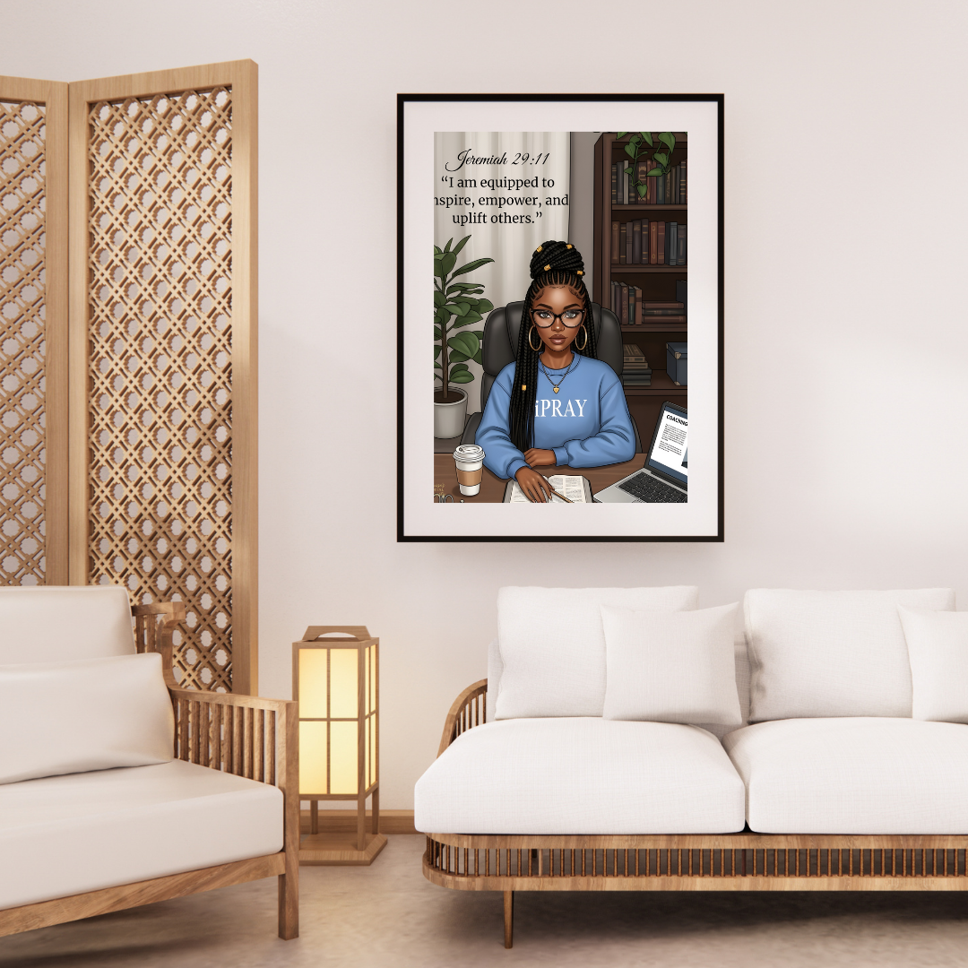 Framed artwork of a woman in a blue shirt with 'PRAY' on it, displayed in a living room.