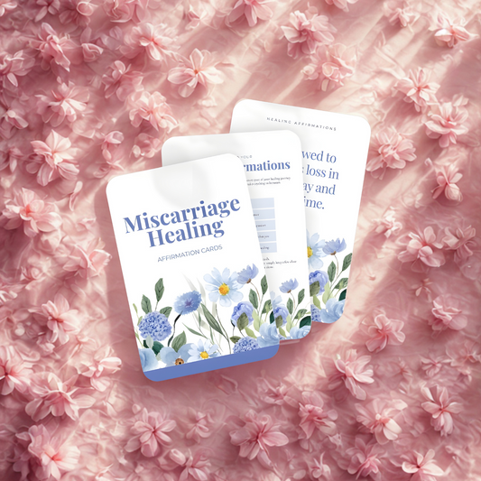 Three books titled 'Miscarriage Healing' on a pink floral background